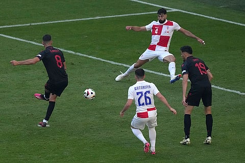 Klaus Gjasula scores his side's second goal